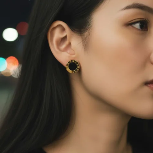 aretes broquel de acero redondo números romanos dorado